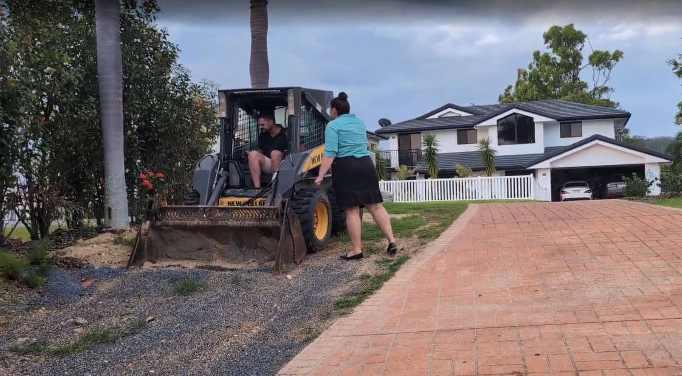Skid steer loader on a residential job